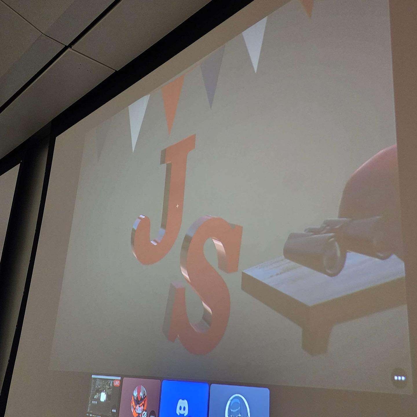 J S letters hung on wall